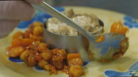 The cook prepares a delicious dish Stock Footage 84081652