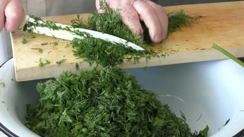 The cook prepares dill. healthy food concept Stock Footage 136176953