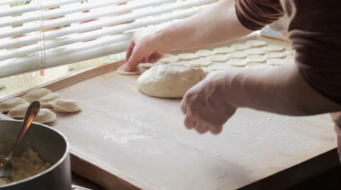 Cook prepares dumplings Stock Footage 64313029