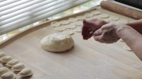 Cook prepares dumplings Stock Footage 64313221