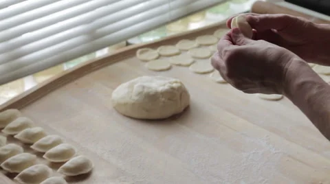 Cook prepares dumplings Stock Footage 64313453