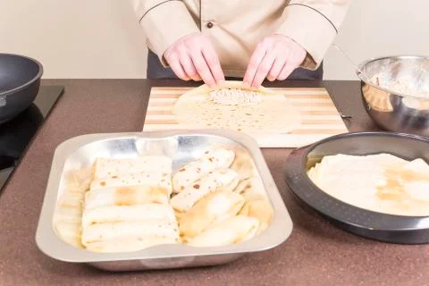 Cook prepares empanadas Stock Photos