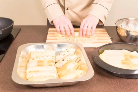 Cook prepares empanadas Stock Photos