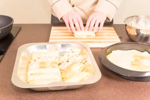 Cook prepares empanadas Stock Photos