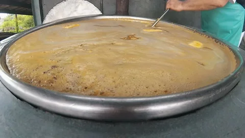 Cook prepares food in large quantities Stock Footage 106588462