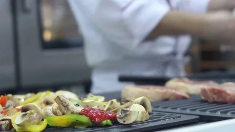 Cook prepares in the kitchen Stock Footage 73425706