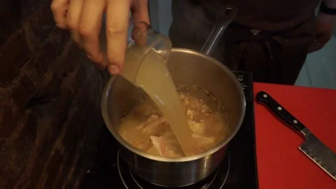 The cook prepares the meat Stock Footage 159881324