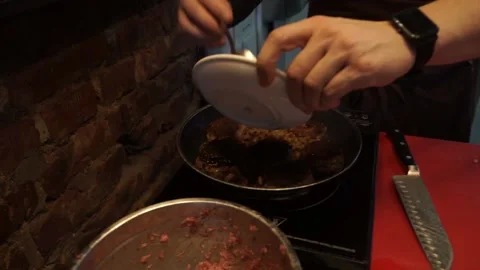 The cook prepares minced meat Stock Footage 159881276