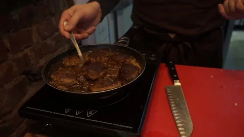 The cook prepares minced meat Stock Footage 159881289