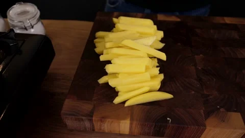 The cook prepares potato chips with salad and delicious sauce. 4K shooting Stock Footage 132724159
