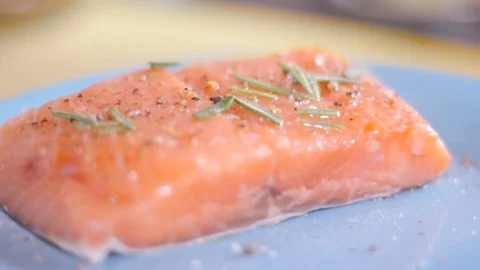 Cook prepares salmon on the grill Stock Footage 109471371