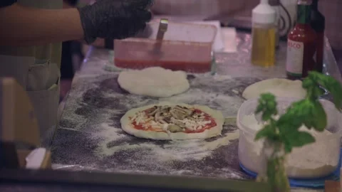 Cook Preparing and Baking Artisan Pizza at Food Stall Stock Footage 341871387