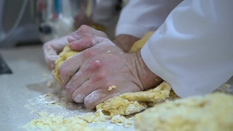 Cook preparing dough for pasta, manual cooking dough in the kitchen Stock-Footage 107077637
