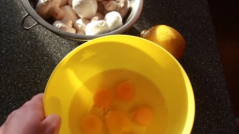 Cook preparing an omelet with mushrooms Stock Footage 108864792