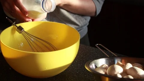 Cook preparing an omelet with mushrooms Stock Footage 108864895