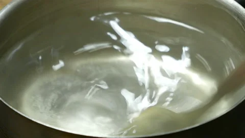 Cook preparing poached egg Stock Footage 104825125