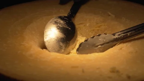 Cook preparing spaghetti in cheese Stock Footage 99541267