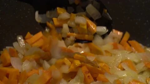The cook is preparing a vegetable stew Stock Footage 162338083