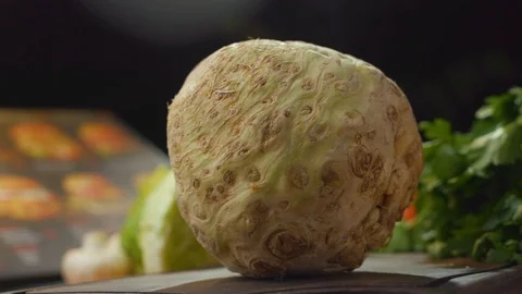 The cook puts the celery root on the table Stock Footage 121701847