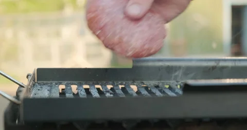 Cook puts Cutlets on Grill. Raw Steaks Fried in Coals. Meat Steaks for Burgers. Stock Footage 130318917