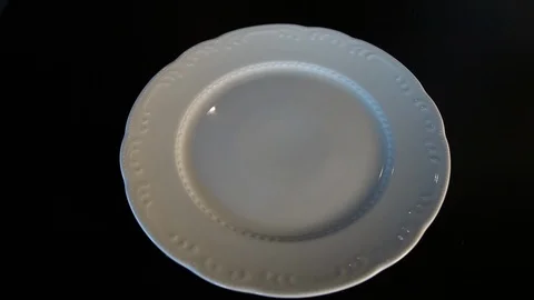 The cook puts the dessert ring on a clean plate.Cooking Ring.Food Ring.Close-up. Stock Footage 123648014