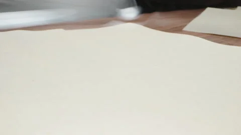The cook puts the dough sheets into a glass lasagna dish. Close-up. Stock Footage 220066407