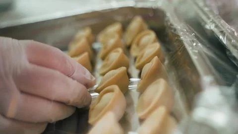 Cook puts dumplings Stock Footage 155203059