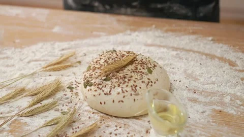 Cook Puts An Ear Of Wheat On Raw Round Dough Stock Footage 273499800