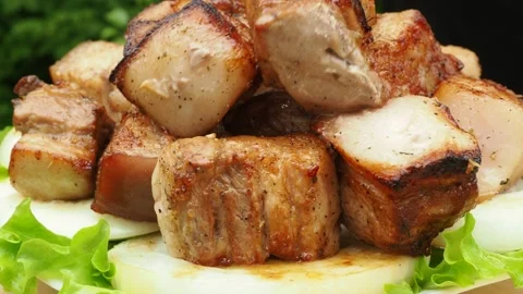 The cook puts the meat on the grill. cooking meat on the fire. 4K Stock Footage 134901892
