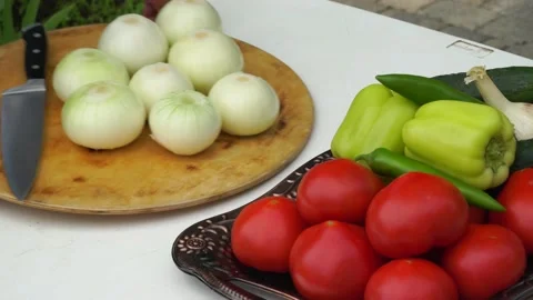 The cook puts the peeled onion on the table Stock Footage 198926908