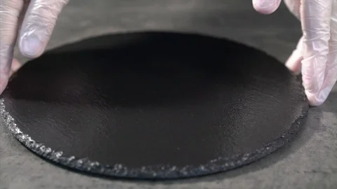 The cook puts the serving board on the table. Stock Footage 126447151