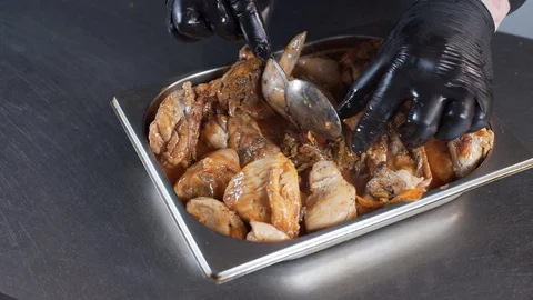 The cook puts vegetables in the middle of the dish Stock Footage 127565463