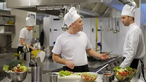 Cook quitting job to chef in kitchen Stock Footage 102746632