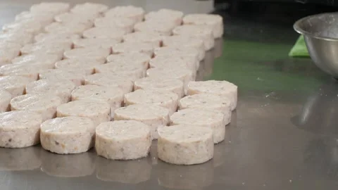 Cook rapidly presses fish mixture into mold producing fluffy fragrant patties Stock-Footage 324866982