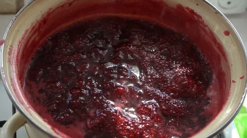 Cook raspberry jam Stock Footage 117769799