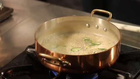 Cook the rice in kitchen Stock-Footage 76390711