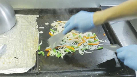 Cook roasts vegetables. Video stock 93166182