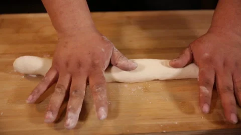 Cook rolls out pancakes (6) Stock Footage 202163492