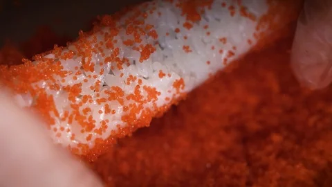 Cook rolls roll in caviar Stock Footage 124211750