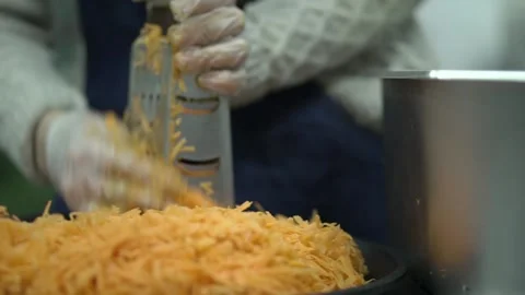 The cook rubs the carrots Stock Footage 156337402