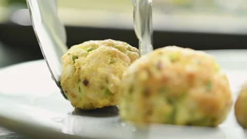 The cook serves turkey meatballs. 스톡 동영상 169798754