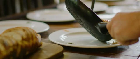 Cook serving omelettes on plates Video stock 105477275