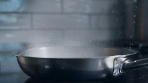 The cook sets fire to a flambe, cooking with fire, roasting and grilling, hot Stock Footage 81368010