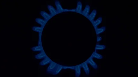 Cook sets fire to the stove burner turning on Stock Footage 103972275