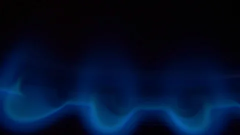 Cook sets fire to the stove burner turning on Stock Footage 103972299