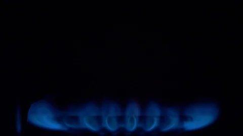 Cook sets fire to the stove burner turning on Stock Footage 103972367