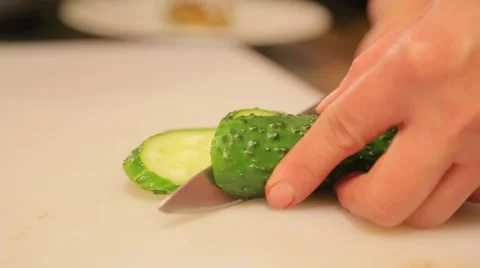 Cook sliced cucumber close up Stock Footage 61157096