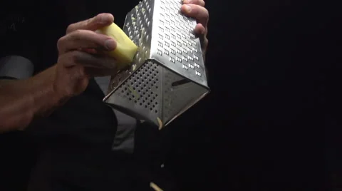 Cook sliced potatoes on a grater Stock Footage 68030679