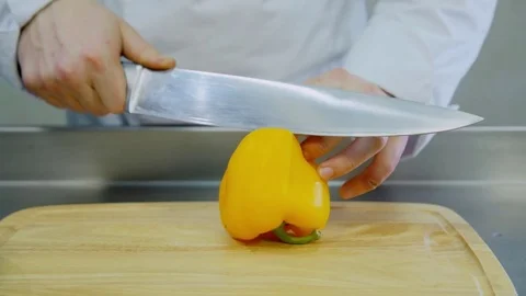Cook slices of yellow pepper Stock Footage 70972479