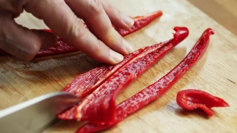 Cook slicing a red pepper Video stock 72222615